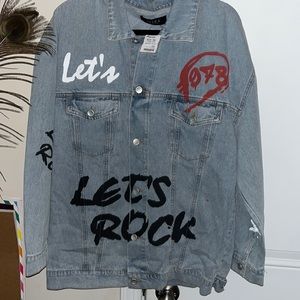 AKIRA woman’s oversized graffiti denim jacket. Size Large. NWT
